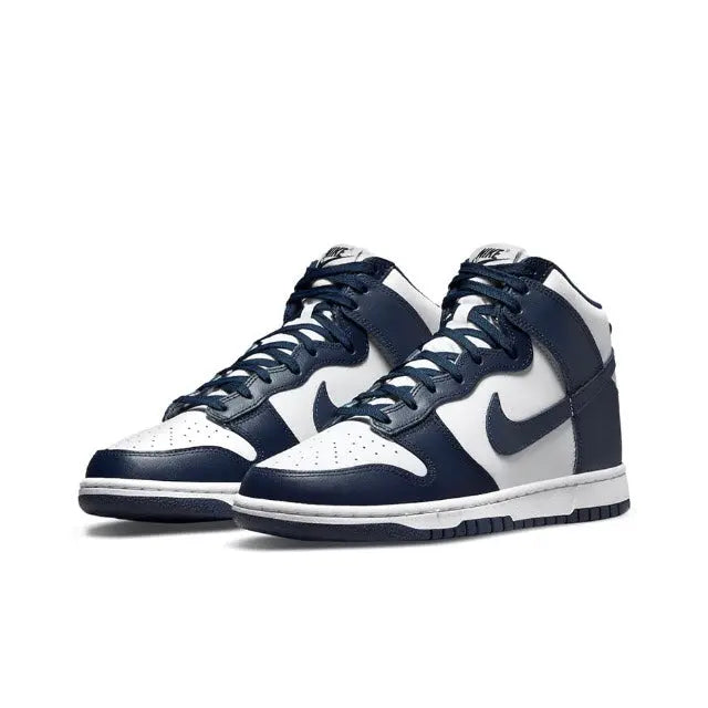 High-top sneakers side view, white leather panels with dark navy Swoosh and laces