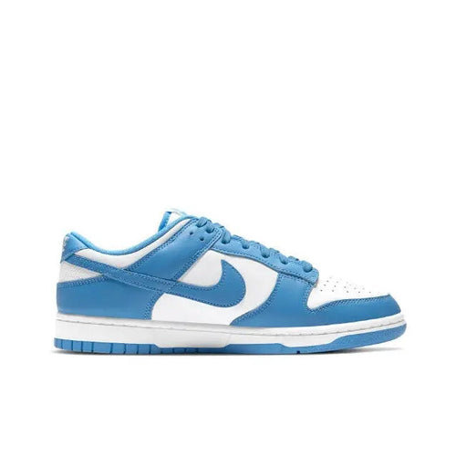 Low-top sneakers in blue and white with white Swoosh and lace-up front