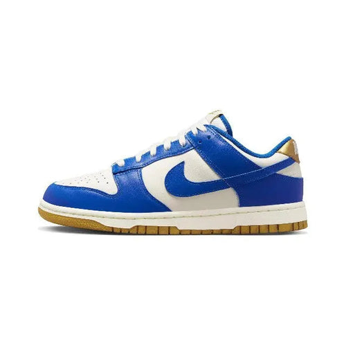 Low-top sneakers with blue and sail panels, blue swoosh, gum outsole