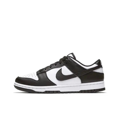 Nike Dunk Low low-top sneakers in black and white, side view with swoosh