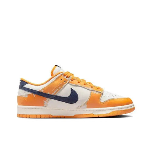 Nike Dunk Low low-top sneakers in sail, orange and navy with orange laces