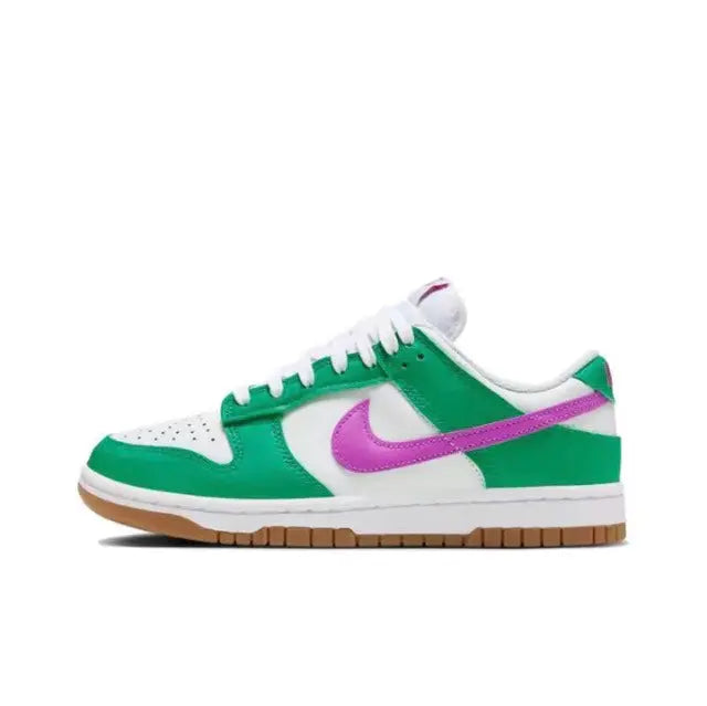 Low-top sneakers in green, white, and purple with gum sole and lace-up design.