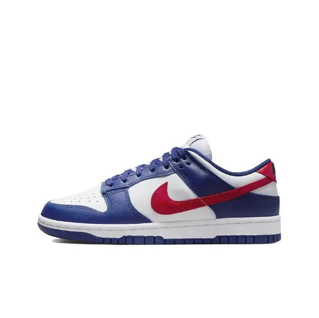Nike Dunk Low low-top sneakers with blue leather, white panels, red swoosh.