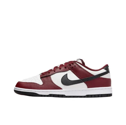 Low-top sneakers in burgundy, white, and black with Nike swoosh
