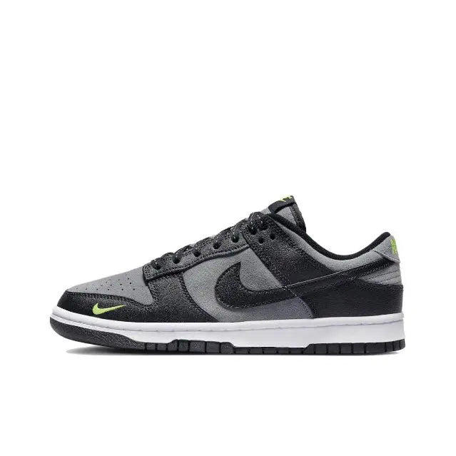 Nike Dunk Low low-top sneakers in black and gray with a green Swoosh