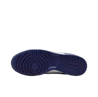 Low-top sneakers: dark blue rubber outsole with textured tread