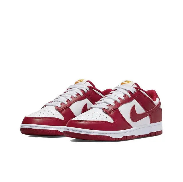 Nike Dunk Low low-top sneakers, two pairs side by side, red overlays over white panels