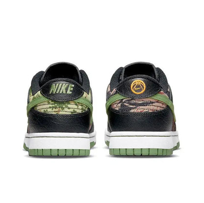 Nike Dunk Low sneakers rear view with black leather, camo overlays, green sole