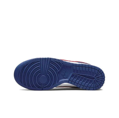 Low-top sneaker outsole in blue rubber with grooved tread and circular traction pattern.