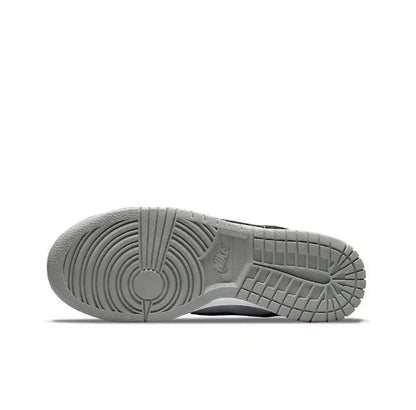 Low-top sneaker outsole, gray rubber traction with curved tread pattern
