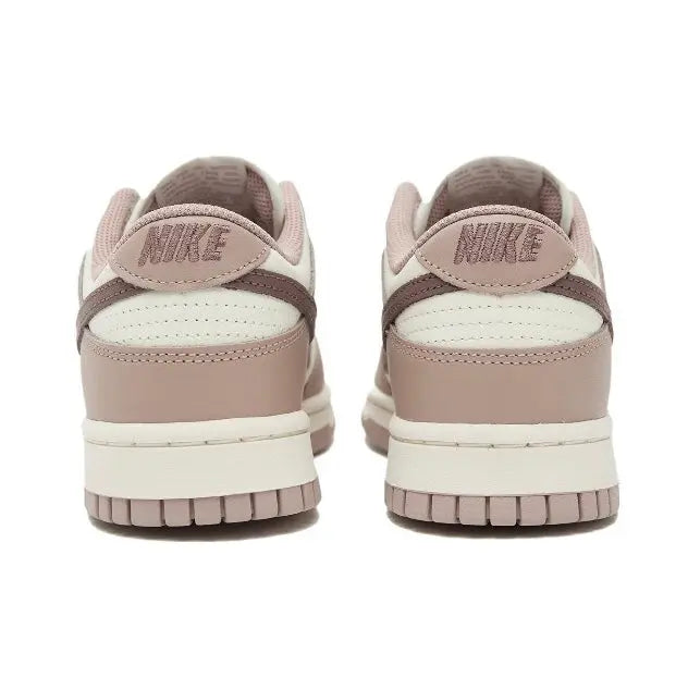 Nike Dunk Low low-top sneakers, heel view, mauve collar and off-white midsole
