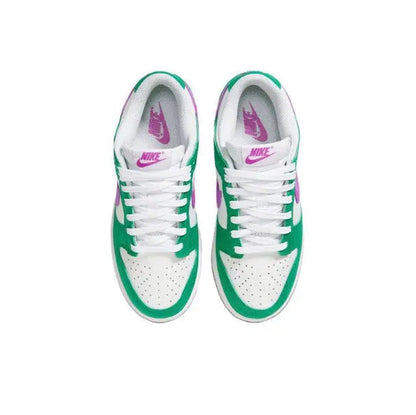 Low-top sneakers: green and white uppers with white laces and purple Nike tongue logo.