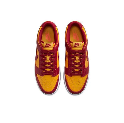 Pair of low-top sneakers with burgundy laces and tongues, Nike logo visible