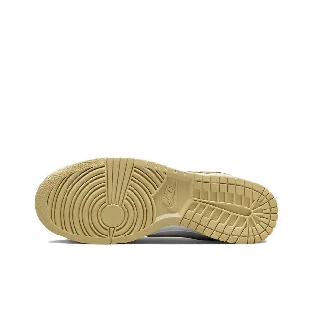 Nike Dunk Low outsole, light gold rubber traction with circular traction pattern