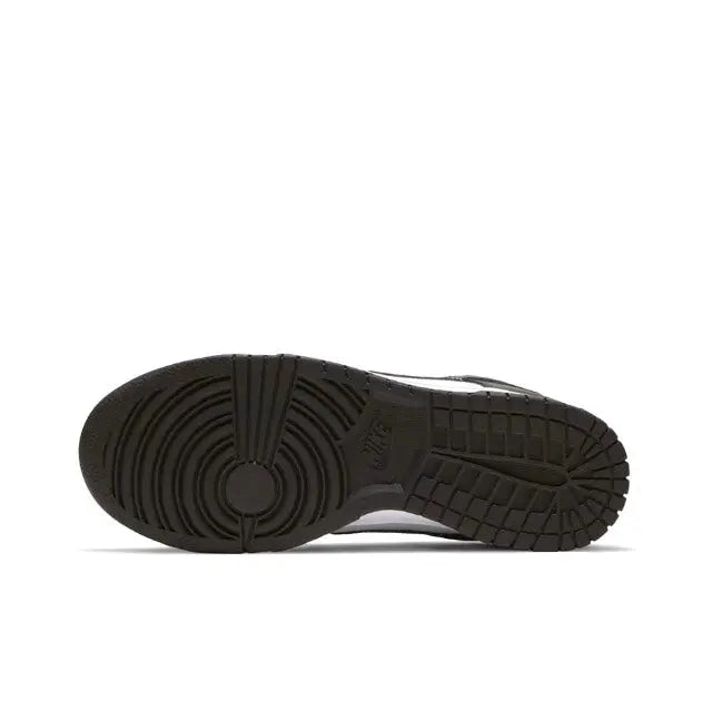Nike Dunk Low outsole view, black rubber tread with curved midsole