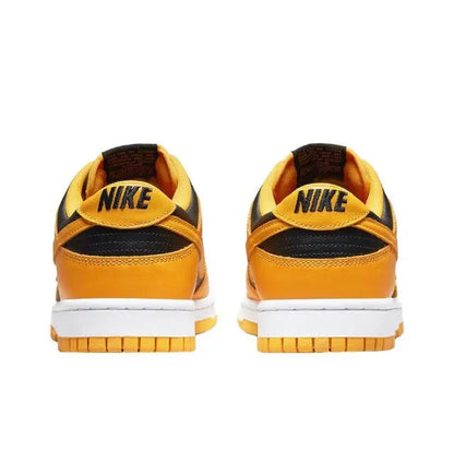 Low-top sneakers heel view, black collar lining, orange uppers, white midsole