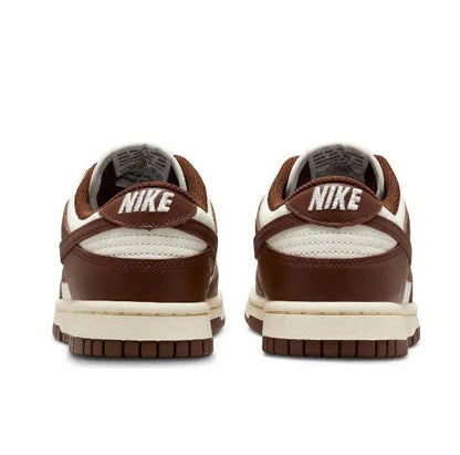 Nike Dunk Low sneakers, heel view, brown panels with white midsoles