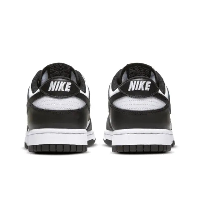 Nike Dunk Low sneakers, black heel with white midsole and NIKE branding