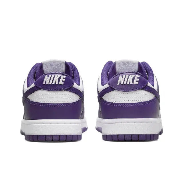 Nike Dunk Low low-top sneaker heel view, white sole and court purple upper.