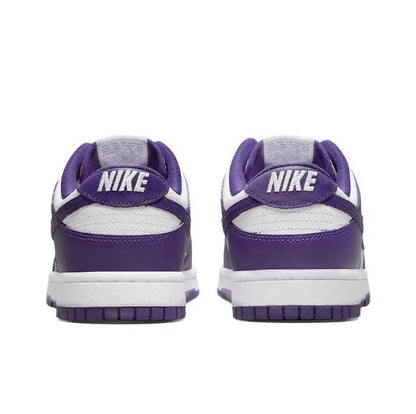 Nike Dunk Low low-top sneaker heel view, white sole and court purple upper.