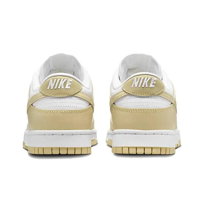 Nike Dunk Low low-top sneaker, white back with light gold heel panel and Nike text