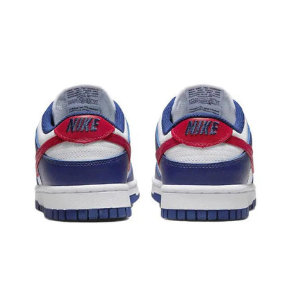 Low-top sneaker heel view, blue and white leather with red heel tab and Nike branding.
