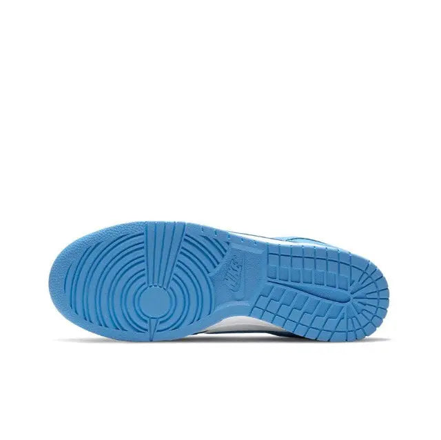 Low-top sneaker outsole in blue with tread pattern and circular logo