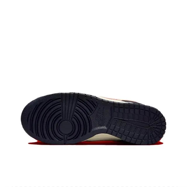 Low-top sneakers outsole with textured traction and dark rubber with red edge