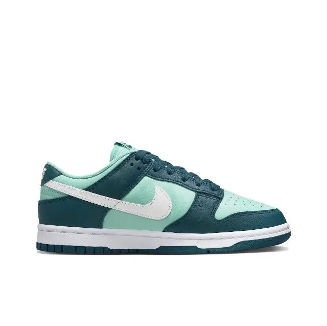 Nike Dunk Low angled side sneaker, teal upper and white swoosh detail
