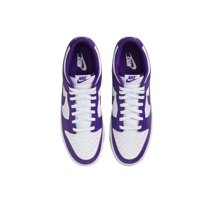 Nike Dunk Low low-top sneaker front view, white laces and court purple accents.