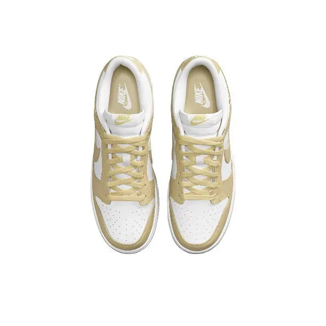 Nike Dunk Low low-top sneaker, white and light gold upper with laces and tongue