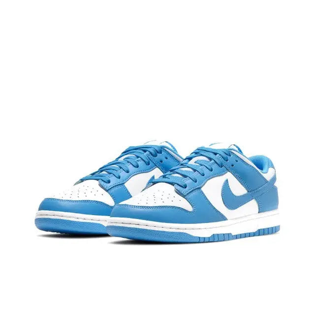 Low-top sneakers front view in blue and white with lace-up eyelets and Swoosh