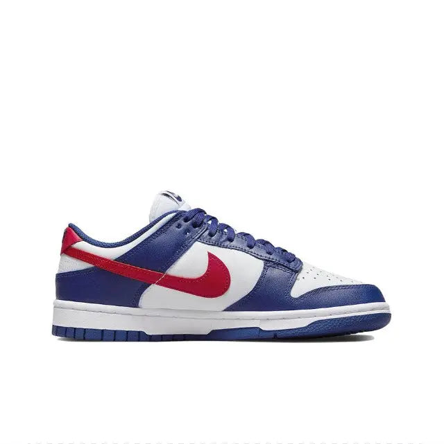 Low-top sneakers, blue and white upper with red swoosh and blue lace-up trim.