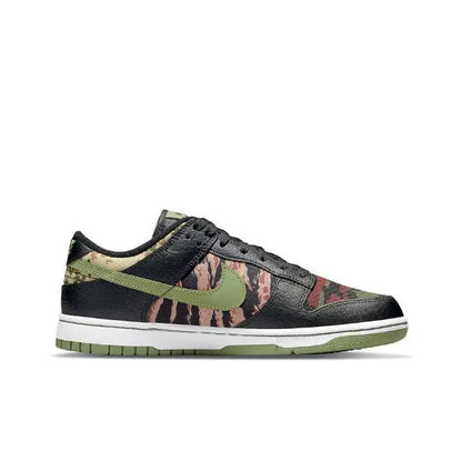 Nike Dunk Low sneakers side profile in black with camo print and green Swoosh
