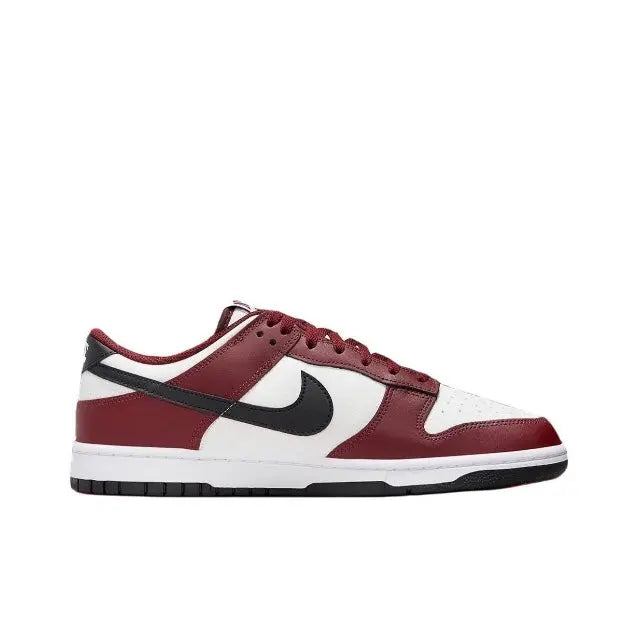 Low-top sneakers with burgundy, white, and black colorblocking and Nike swoosh