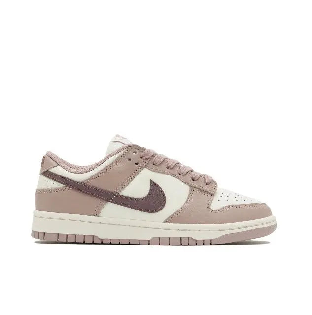 Nike Dunk Low low-top sneakers, side profile, off-white leather with taupe and mauve accents