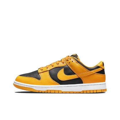 Low-top sneakers angled side view, orange upper with black Swoosh and white midsole