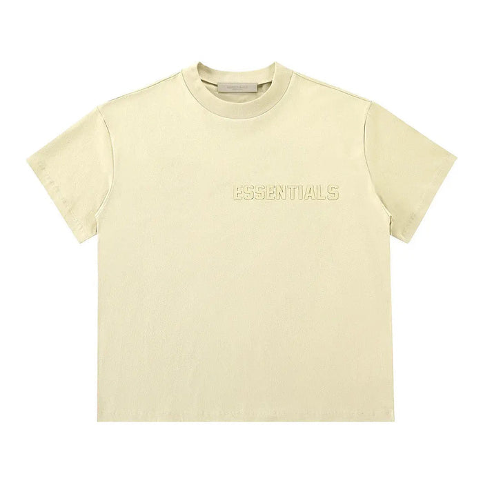 Light yellow T-shirt with 'ESSENTIALS' chest logo