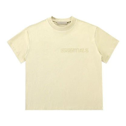 Light yellow T-shirt with 'ESSENTIALS' chest logo
