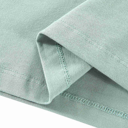 Light blue T-shirt sleeve cuff with stitched hem and lace-like trim