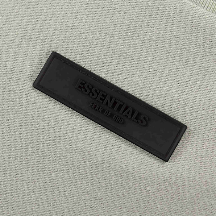 Essentials T-shirt black woven label with ESSENTIALS text