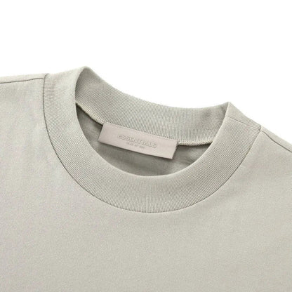 Essentials T-shirt neckline with ribbed crew collar and small interior tag