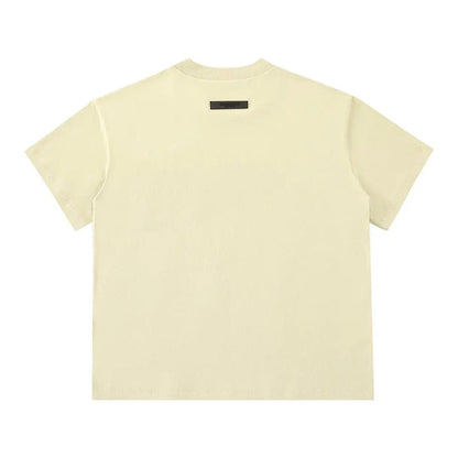 Light yellow T-shirt back view with small neck label