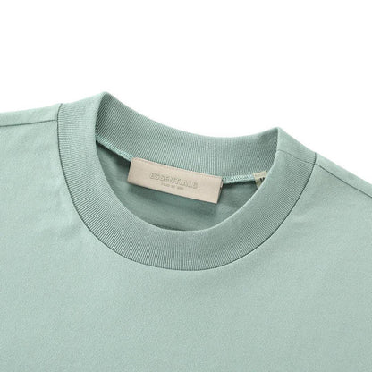 Light blue crew-neck T-shirt with interior neck label