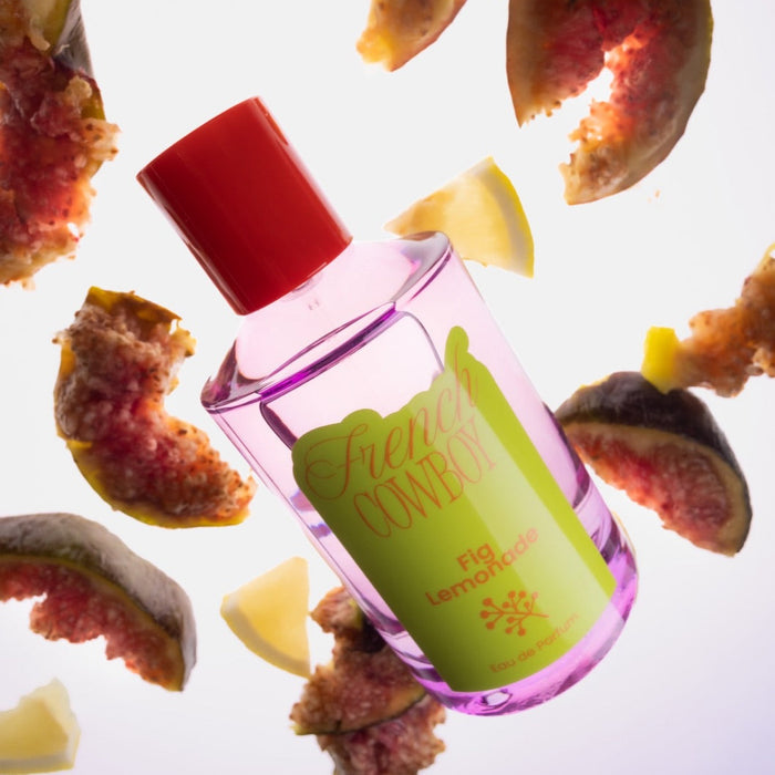 French Cowboy Fig Lemonade bottle with floating fig and lemon pieces