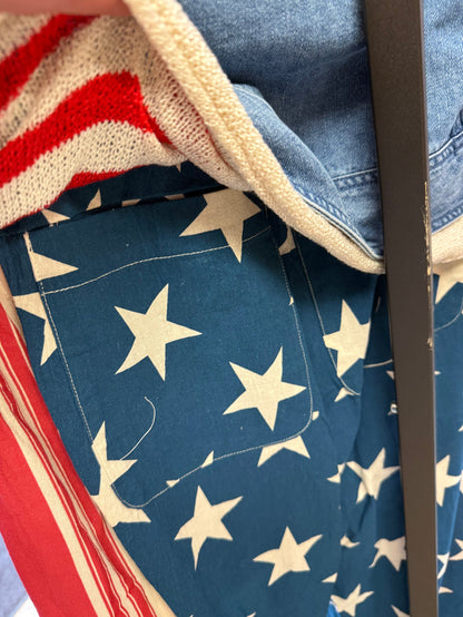 Flag print drawstring pants with blue base and large cream stars, side stripe panels