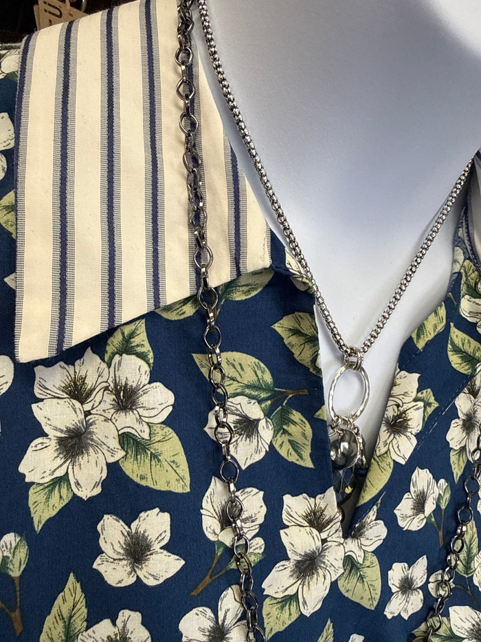 Floral cotton pullover neckline with V opening, button placket, and navy striped yoke