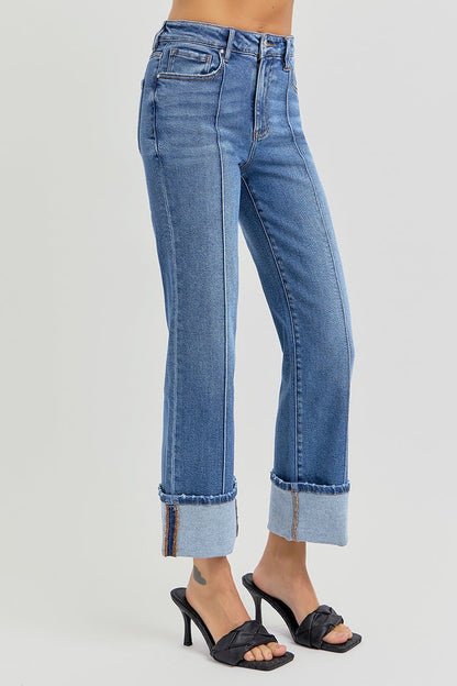 Medium-wash front-seam jeans with cuffed hems and five-pocket styling.