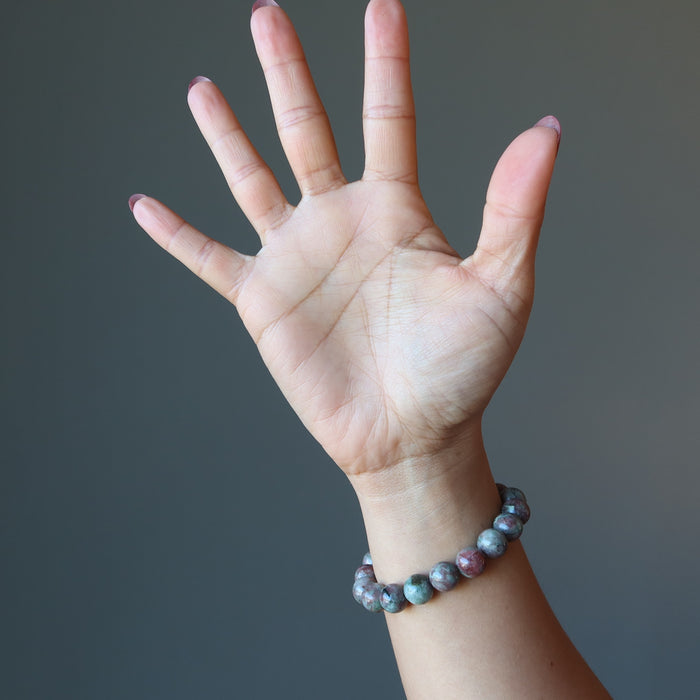 hand wearing kashgar garnet bracelet