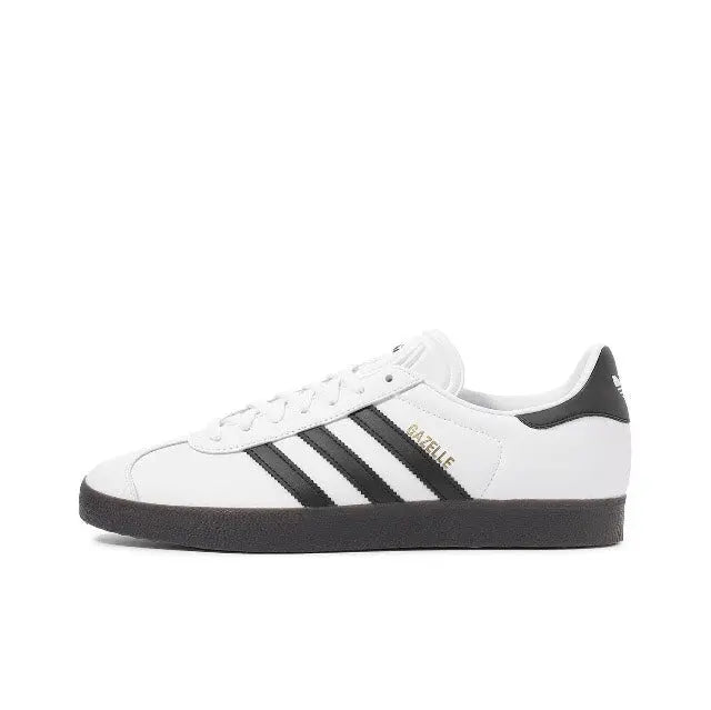 Adidas Gazelle Indoor sneakers in white with black stripes and black heel tab